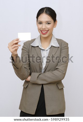 businees woman smiling and holding name card isolate 