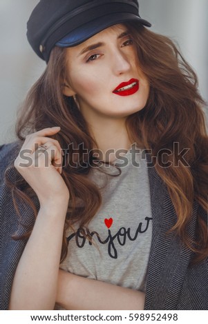 Outdoor portrait of a beautiful and fashion young woman