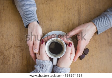 Cup of coffee for Breakfast in the hands of lovers.
