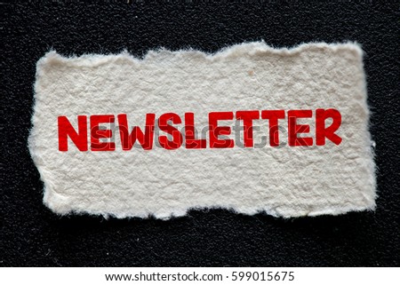 Newsletter/ Note with Newsletter on the wooden background