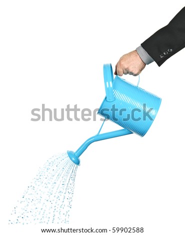 Hand of a businessman pouring water from watering can Royalty-Free Stock Photo #59902588