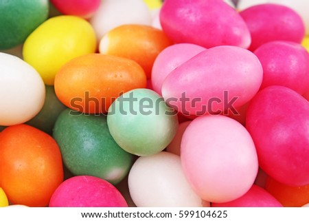 Easter candy. Egg shaped sugar candy for easter season. Easter celebration photo with colorful candy eggs.