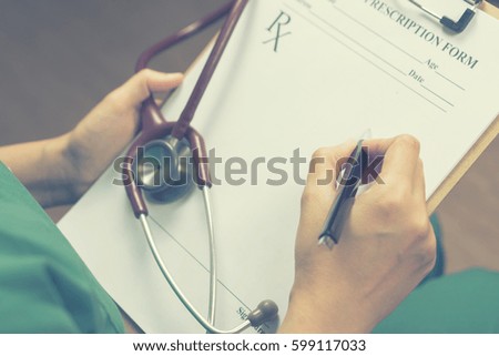 female doctor,surgeon,nurse,pharmacy with stethoscope on hospital holding clipboard,writing a prescription,Medical Exam,Healthcare and medical concept,test results,vintage color,selective focus