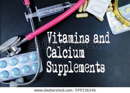 Vitamins and Calcium Supplements word, medical term word with medical concepts in blackboard and medical equipment