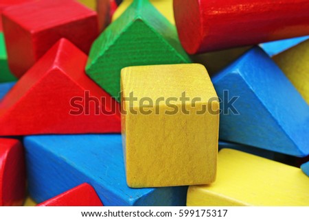 Wooden toy background. Red, Blue, Yellow Green Wooden toy blocks on white background. Wood block texture pattern.