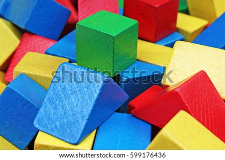 Wooden toy background. Red, Blue, Yellow Green Wooden toy blocks on white background. Wood block texture pattern.
