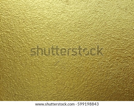Gold concrete wall texture background