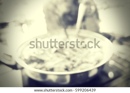 Picture blurred  for background abstract and can be illustration to article of people eat sukiyaki in restaurant