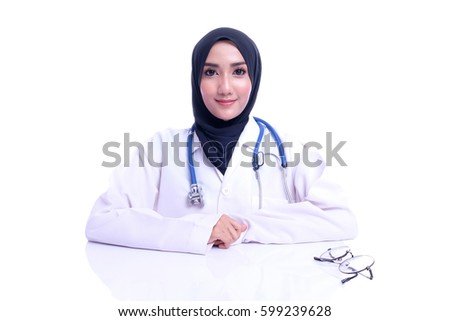 Portraiture of confidence Muslim doctor with over white background.