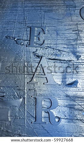 abstract background with signs on scratched metallic back
