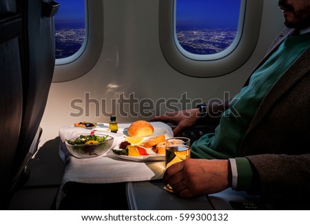 Tray of food on the airplane, business class
