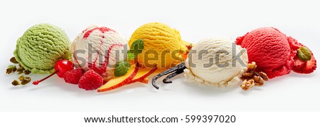 Set of ice cream scoops of different colors and flavours with berries, nuts and fruits decoration isolated on white background Royalty-Free Stock Photo #599397020