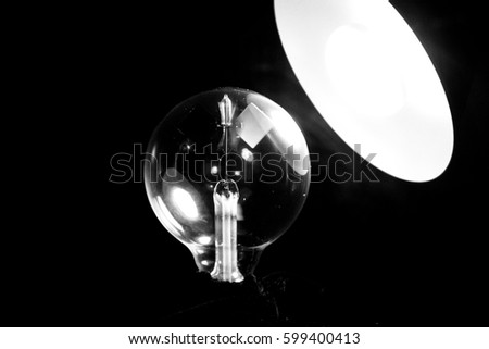 Bulb with light on, energy and power