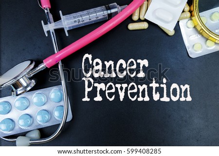 Cancer Prevention word, medical term word with medical concepts in blackboard and medical equipment