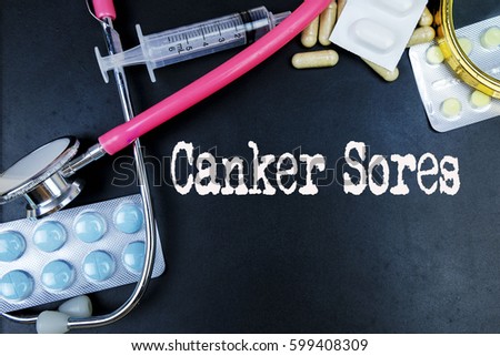 Canker Sores word, medical term word with medical concepts in blackboard and medical equipment