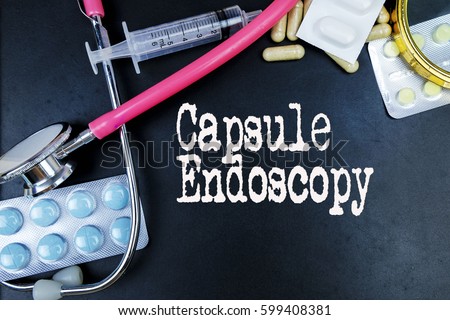 Capsule Endoscopy word, medical term word with medical concepts in blackboard and medical equipment