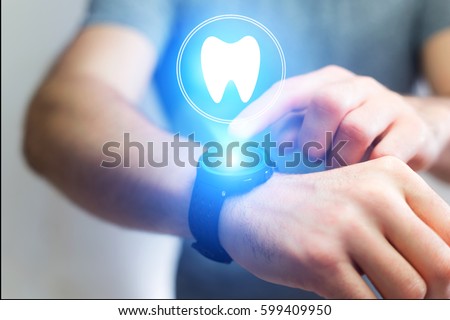 Concept view of making an appointement with a dentist on internet - technology concept