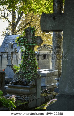 Tombs and crosses in Pere Lachaise Cemetery in Paris, France