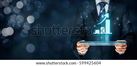 Business growth analysis concept. Businessman plan growth and increase of positive indicators in his business. Royalty-Free Stock Photo #599425604