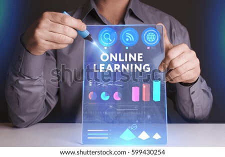 Business, Technology, Internet and network concept. Young businessman working on a virtual screen of the future and sees the inscription: Online learning
