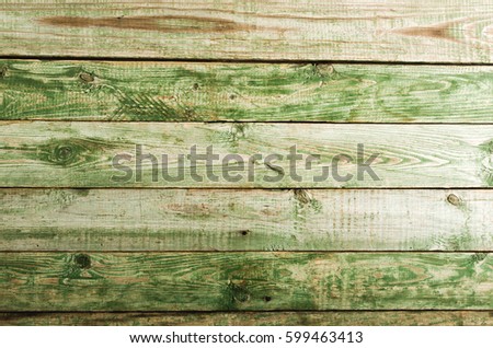 Old rustic green wooden table. St. Patrick's day background