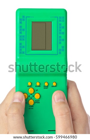 Hands with electronic tetris game isolated on white background