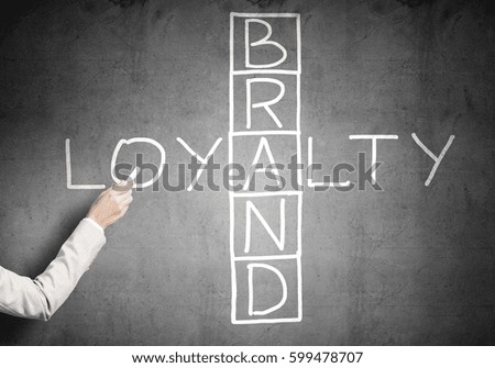 Business concept with crossword drawn on blackboard
