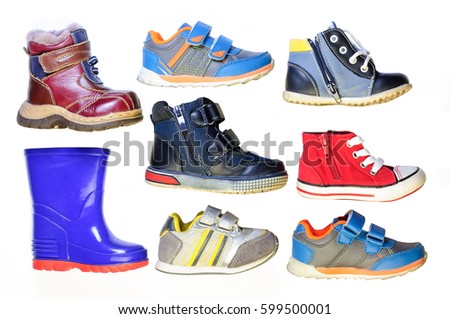 Children's shoes for different weather and time of year . Royalty-Free Stock Photo #599500001