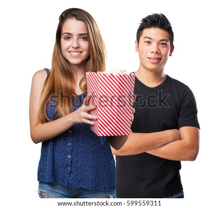 young cute woman holding popcorn