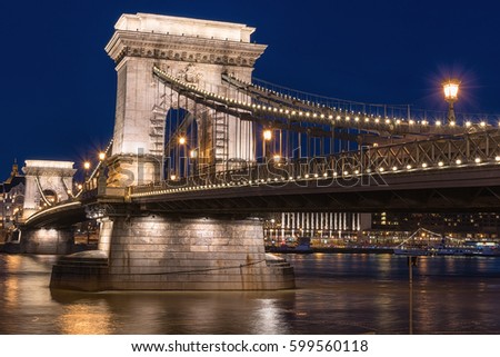 Budapest Chain bridge (Szechenyi lanchid) at twilight blue hours, one of the most popular tourist destination in Europe Royalty-Free Stock Photo #599560118