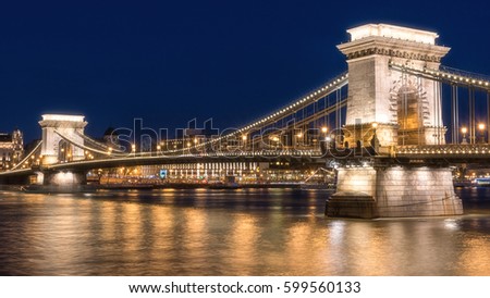 The Chain bridge (Szechenyi lanchid) at night Budapest, one of the most popular panoramic view in the capital of Hungary, Europe Royalty-Free Stock Photo #599560133