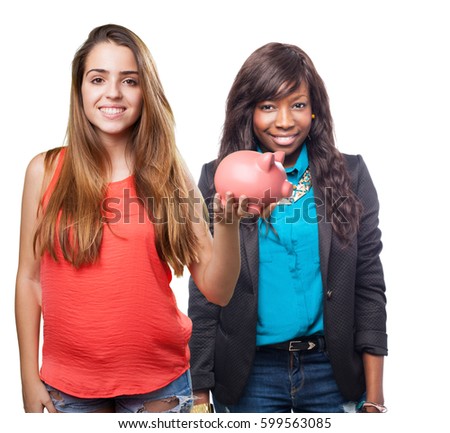 young cute woman saving with a piggy bank