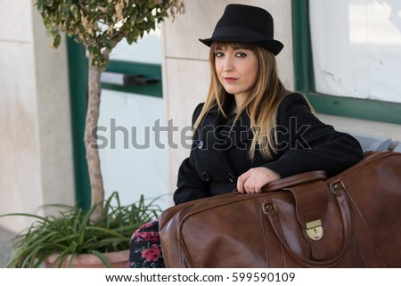 Girl with a Suitcase