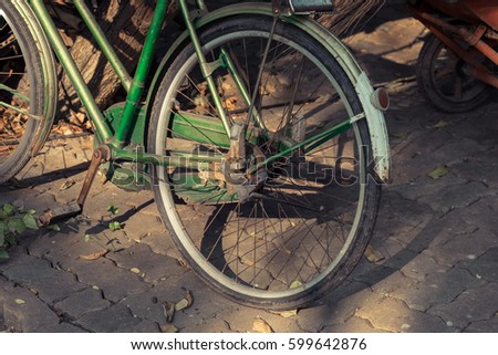 Old bicycle wheel parts background.