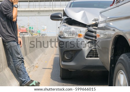 Car crash from car accident on the road in a city wait insurance.