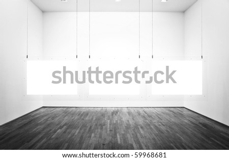 Black & white exhibition room with three pictures and white background