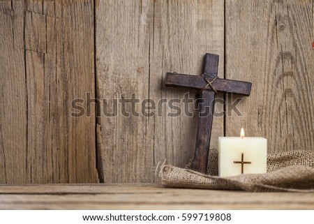 Christian cross and candle.