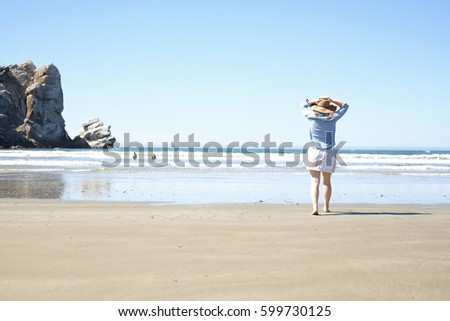 A beautiful, young woman on the beach