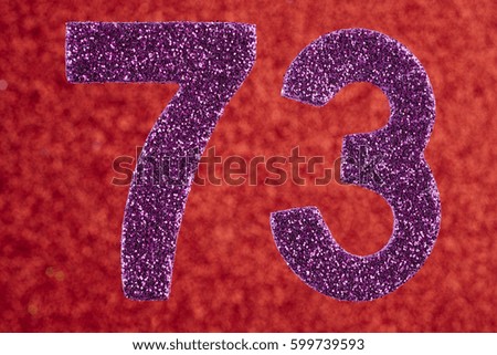 Number seventy-three purple color over a red background. Anniversary. Horizontal