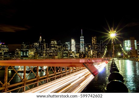 Car light on brooklyn bridge in night time, NYC, USA