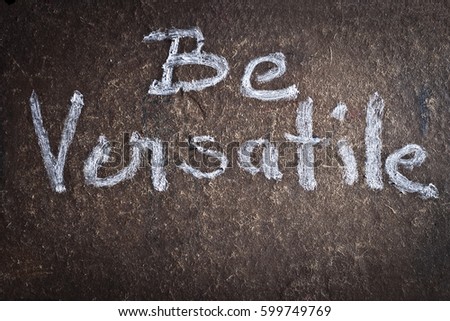 " Be Versatile " written on the wall.