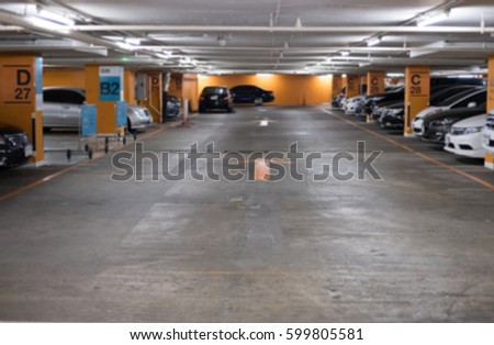Underground car park with cars view is blur background