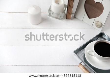 Items on a wooden table, decorations for a house