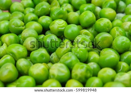 
Fresh Frozen pea peas texture background. Green peas background pattern.