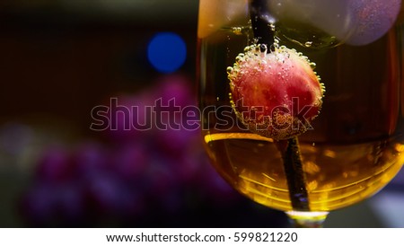 Grapes floating in champagne creating lots of bubbles