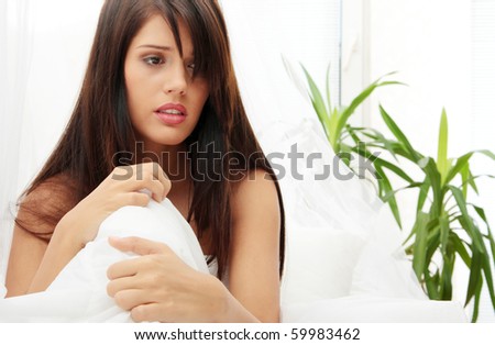 Young beautiful caucasian woman in bed abused Royalty-Free Stock Photo #59983462