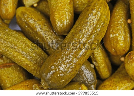 Pickles as background. Green pickle texture pattern. 
pickled cucumber,
