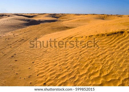 Road across Sahara desert