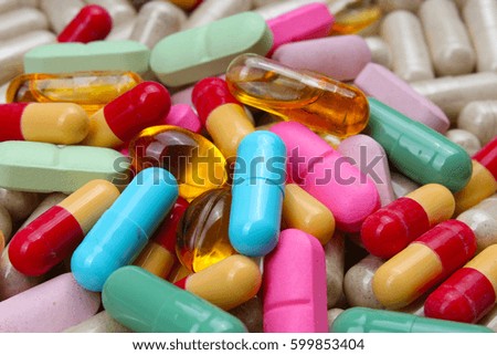Medical or vitamin pills. Colorful medicine pills as texture. Pill pattern background.
