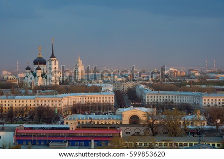 Cloudy evening Voronezh cityscape, railway station, cathedral, railway management tower with clock